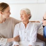 Family caring for senior woman