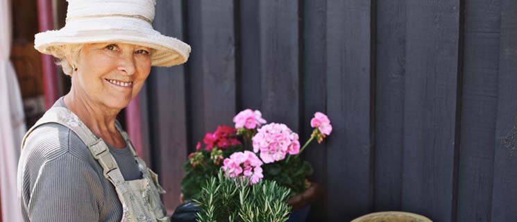 Retired woman working in garden